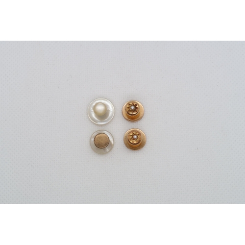 217 - Two 15ct (hallmarked) buttons with pearls - approx weight 2.6 grams - together with two mother of pe... 