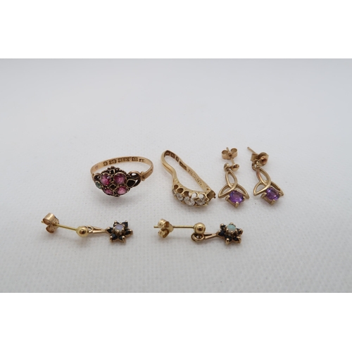 221 - Two pairs of approx 9ct (tested) earrings together with two broken rings, 2.5 grams, one 18ct ring w... 