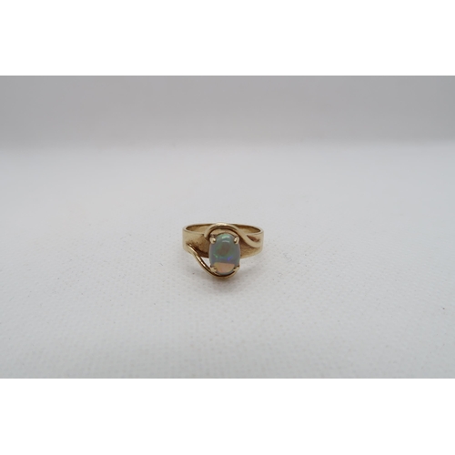 223 - A 9ct yellow gold (hallmarked) and opal ring size I/J - approx weight 3 grams