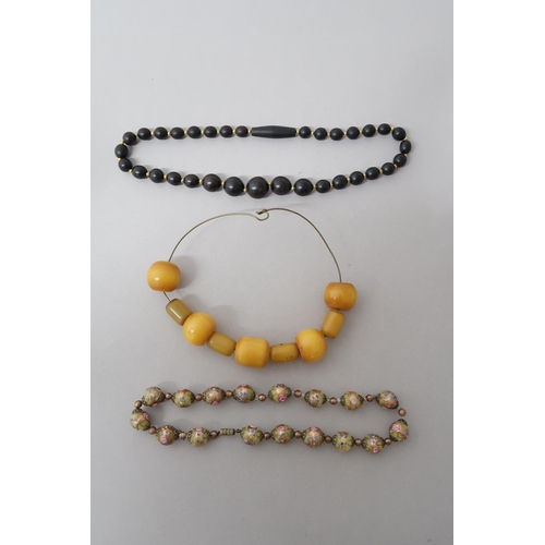 227 - Three necklaces, one amber, one Venetian glass