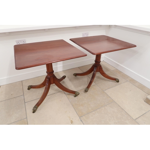 556 - A pair of mahogany lamp/hall tables with a 74cm x 74cm top