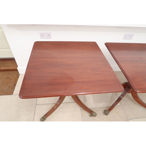 556 - A pair of mahogany lamp/hall tables with a 74cm x 74cm top