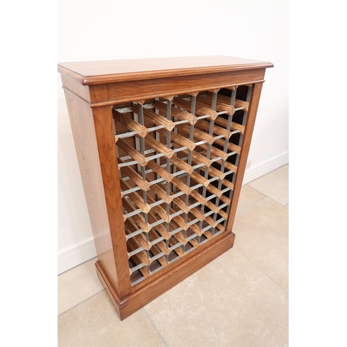 565 - An oak 48 bottle wine rack - Width 71cm x Depth 28cm x Height 100cm - made by a local cabinet maker ... 