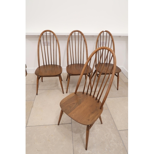 566 - A set of four Ercol dining chairs