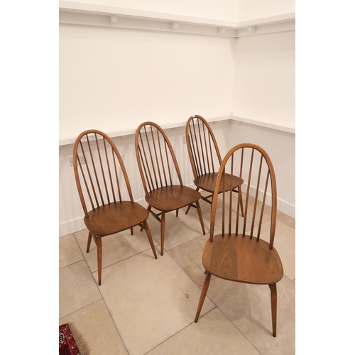 566 - A set of four Ercol dining chairs