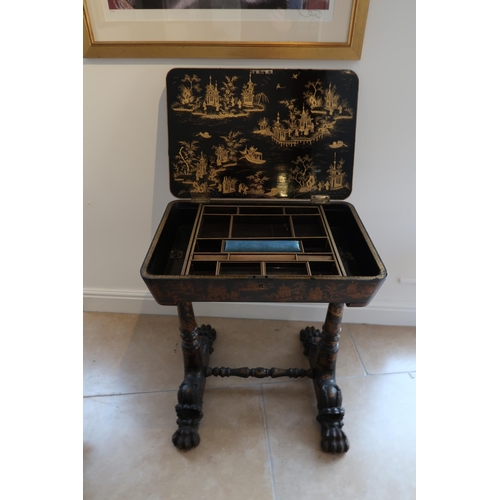 503 - A 19th century chinoiserie lacquered work table with tapered legs and hairy paw feet - Height 78cm x... 