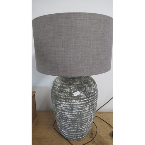 362 - A good quality new rustic style table lamp and shade