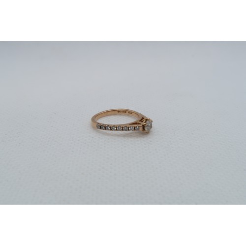 233 - An 18ct rose gold (hallmarked) diamond solitaire ring - The central diamond approx 0.2ct and set wit... 