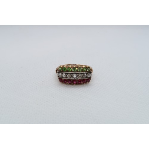 237 - An 18ct yellow gold (hallmarked) ring with diamond, peridot and rubies - ring size P - weight approx... 