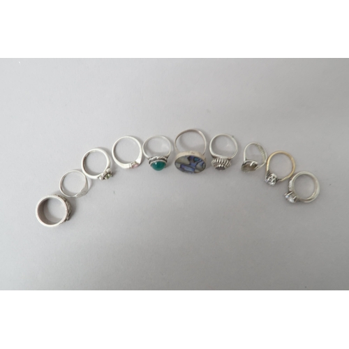 104 - Ten silver rings, various