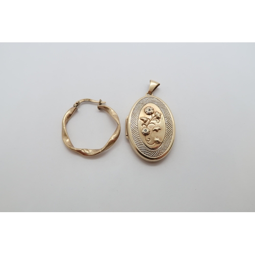 110 - A 9ct (hallmarked) locket and earring - approx weight 4.7 grams