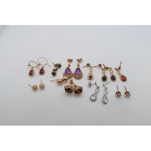 127 - Ten pairs of 9ct earrings, various - weight approx 8.9 grams