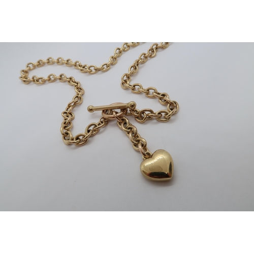 147 - A 9ct hallmarked yellow gold watch chain style necklace with T-bar and heart charm, 52cm long, appro... 