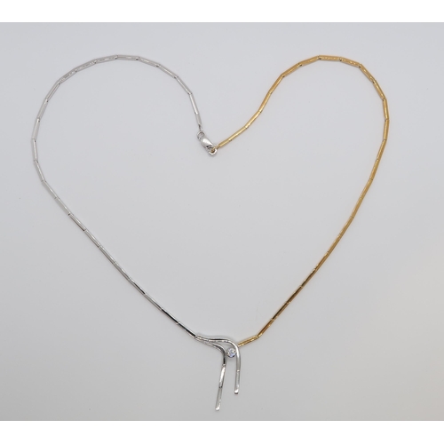 148 - An 18ct hallmarked bi-colour gold necklace set with diamond, approx 42cm long, approx 10.2 grams