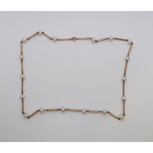 149 - A 9ct hallmarked yellow gold and pearl necklace, 43cm long, approx 7.1 grams