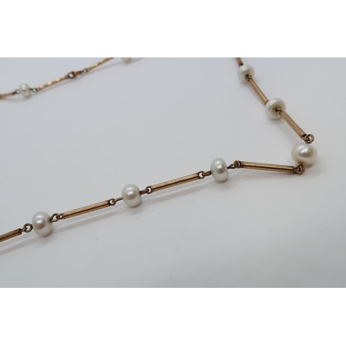 149 - A 9ct hallmarked yellow gold and pearl necklace, 43cm long, approx 7.1 grams