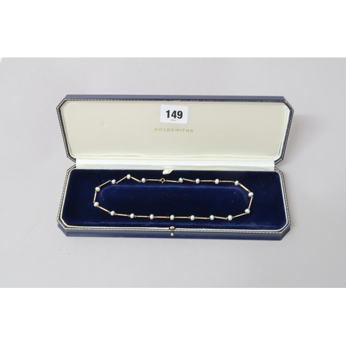 149 - A 9ct hallmarked yellow gold and pearl necklace, 43cm long, approx 7.1 grams