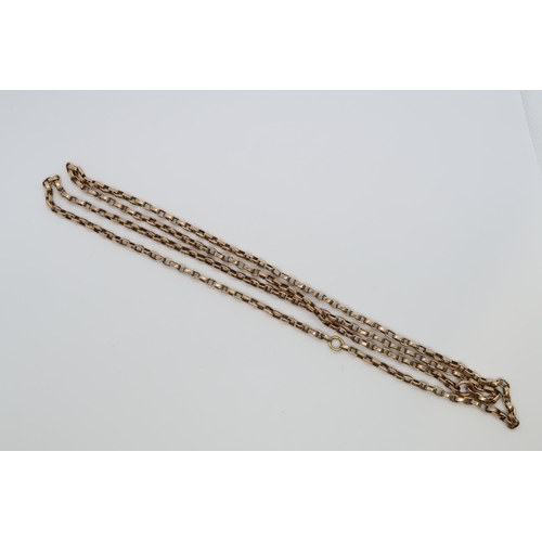 157 - A 9ct (hallmarked) yellow gold guard chain, continuous link - 37cm - weight approx 12.2 grams