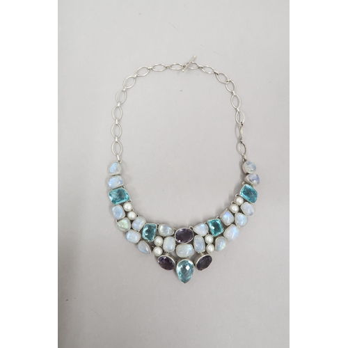 162 - A modernist sterling silver moon stone, blue zircon, amethyst and pearl necklace