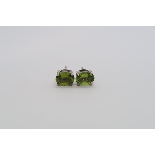 171 - A pair of Peridot studs in silver