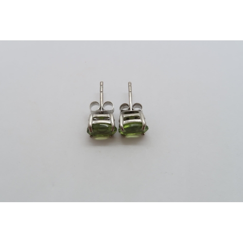 171 - A pair of Peridot studs in silver