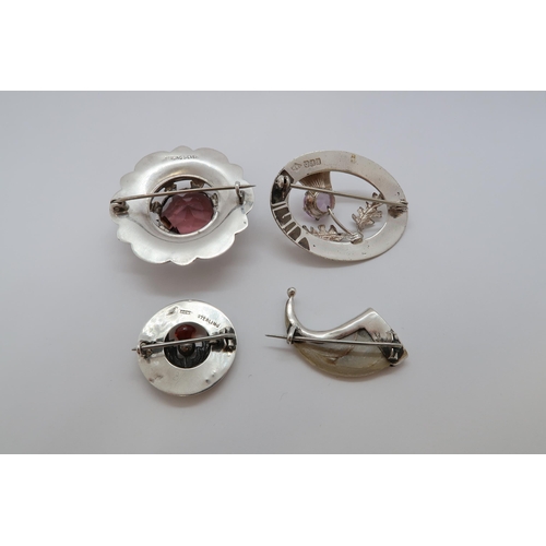 188 - Four sterling silver vintage Scottish brooches