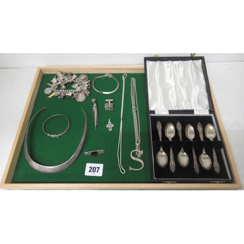 207 - Silver jewellery to include - charm bracelet, chains etc together with a set of six silver teaspoons... 