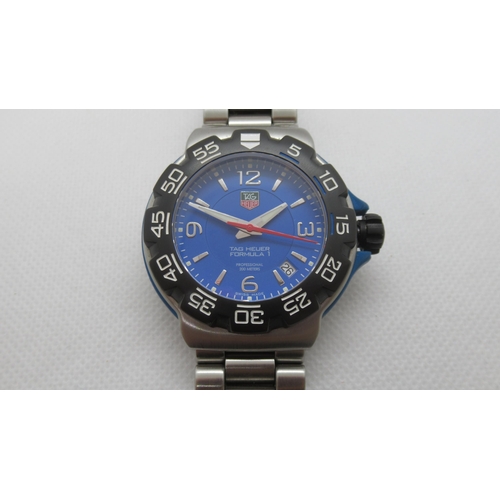 253 - A Tag Heuer Formula 1 quartz gents bracelet wristwatch with blue dial model WAC 1112 serial SF6825 w... 