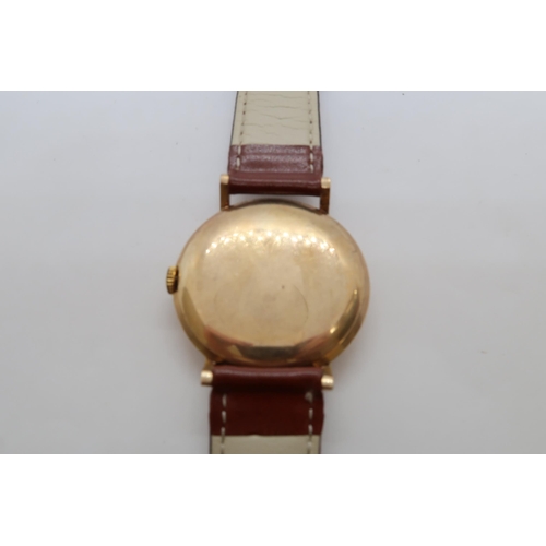 256A - A gents 9ct gold cased Longines manual wind wristwatch - case 34mm - with seconds sub dial - working... 