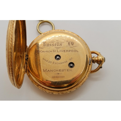 257 - An 18ct yellow gold (hallmarked) open faced fob watch, finely chased, double case 4cm - T.R. Russell... 