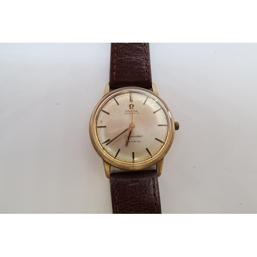 258A - A gents 9ct gold cased Omega Seamaster Geneve Automatic wristwatch - case 34mm - working in the sale... 