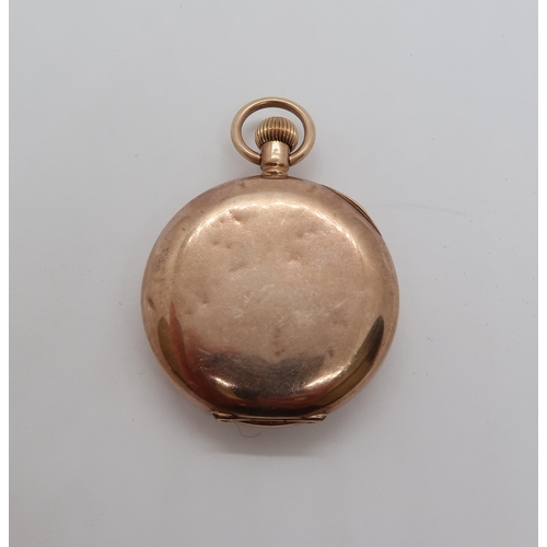 259 - A 9ct gold fob watch with a 3cm diameter dial