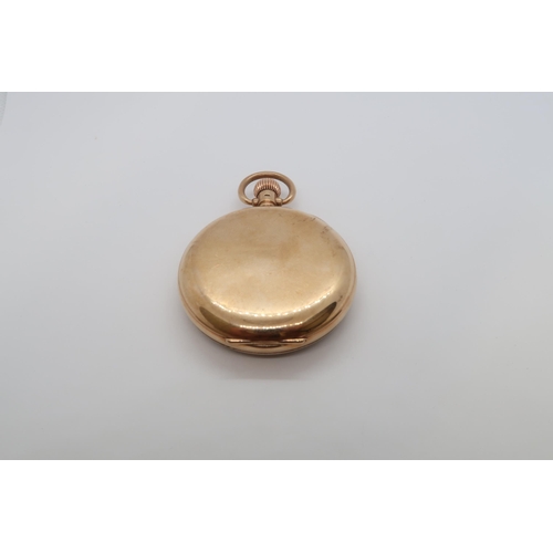 268 - A 9ct hallmarked red gold double cased open face pocket watch, approx 5cm diameter, working in saler... 