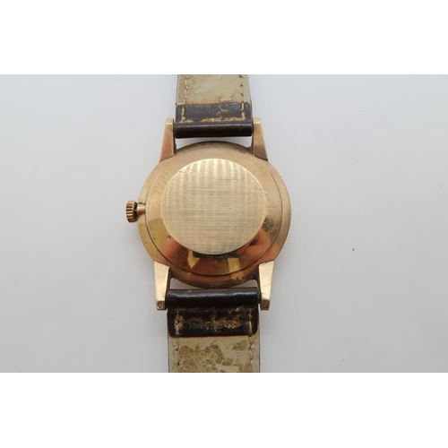 271A - A gents 9ct gold cased Invicta manual wind wristwatch - case 33mm - working in the saleroom