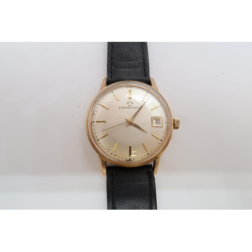 275A - A gents gold cased Eternamatic wristwatch - 33mm - with date aperture