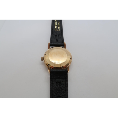 275A - A gents gold cased Eternamatic wristwatch - 33mm - with date aperture