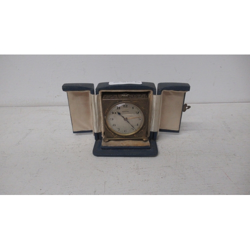 280B - A Zenith travelling miniature alarm clock - approx 5cm x 5.5cm - in original case - not currently wo... 