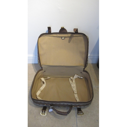 359 - A vintage Gucci suitcase with Gucci monogram throughout with leather straps - 60cm x 40cm