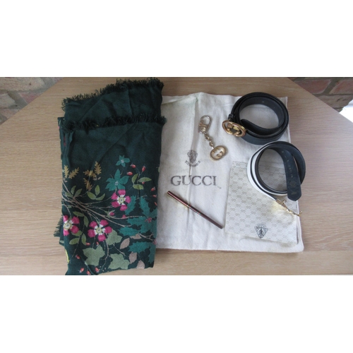 363 - A Gucci shawl 130cm x 130cm together with other Gucci accessories including pen, key ring, belts etc