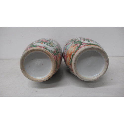 374 - A pair of 19th century Chinese Cantonese enamel vases - 26cm