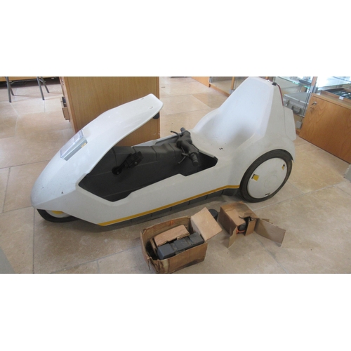 381 - A Sinclair C5 with its original packaging - sold as seen - no key but some spares