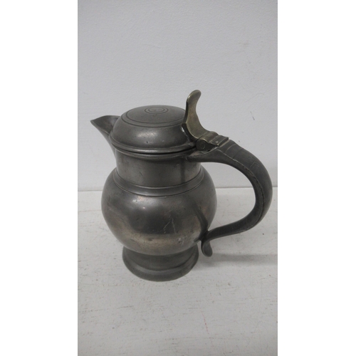 407 - A Pewter ale jug circa 1790 with receipt date 11/11/95 for £200