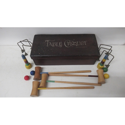 464 - A table croquet set