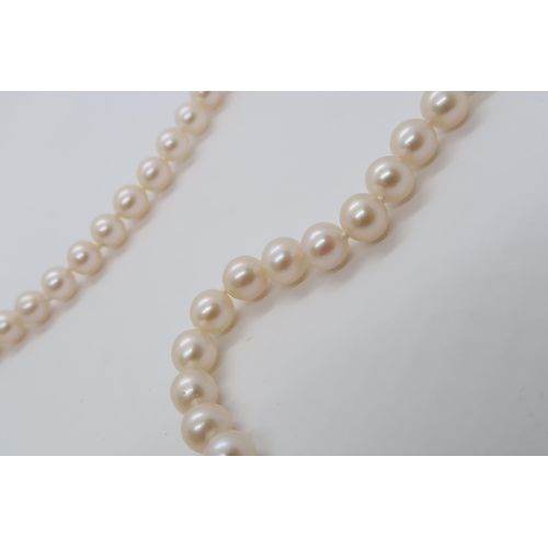 48 - A single string of cultured pearl necklace 'Sea Magic' by Mikimoto with 14ct yellow gold (hallmarked... 