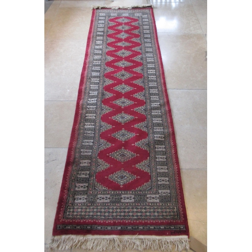 487 - An Eastern hand knotted runner/rug - 280cm x 80cm