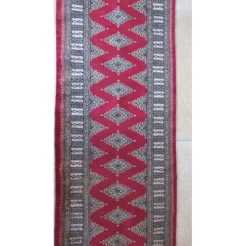 487 - An Eastern hand knotted runner/rug - 280cm x 80cm