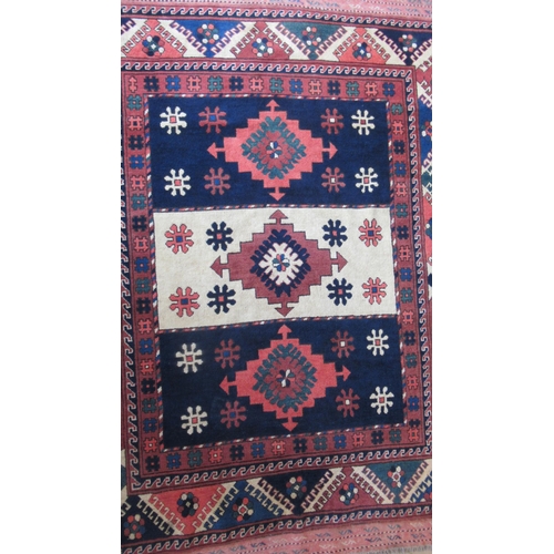 488 - An Eastern hand knotted rug - 185cm x 135cm