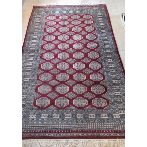 490 - An Eastern hand knotted rug - 250cm x 150cm