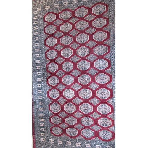 490 - An Eastern hand knotted rug - 250cm x 150cm