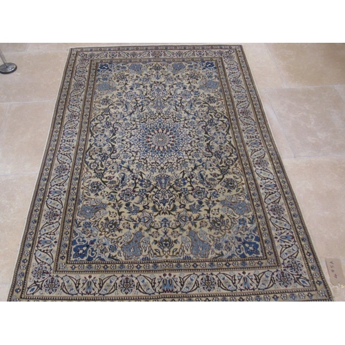 495A - A hand knotted woollen Nain rug - 1.95m x 1.32m